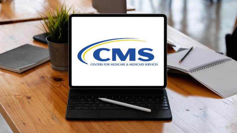 CMS Logo on Laptop